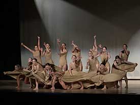 A group of modern dance performers on stage in a theater.Progress OKC worked with the community on updates and repairs to the theater.